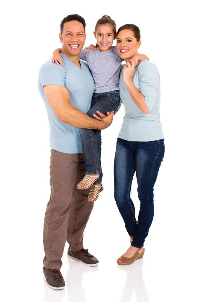 A dad, mom and young girl pose together, smiling.